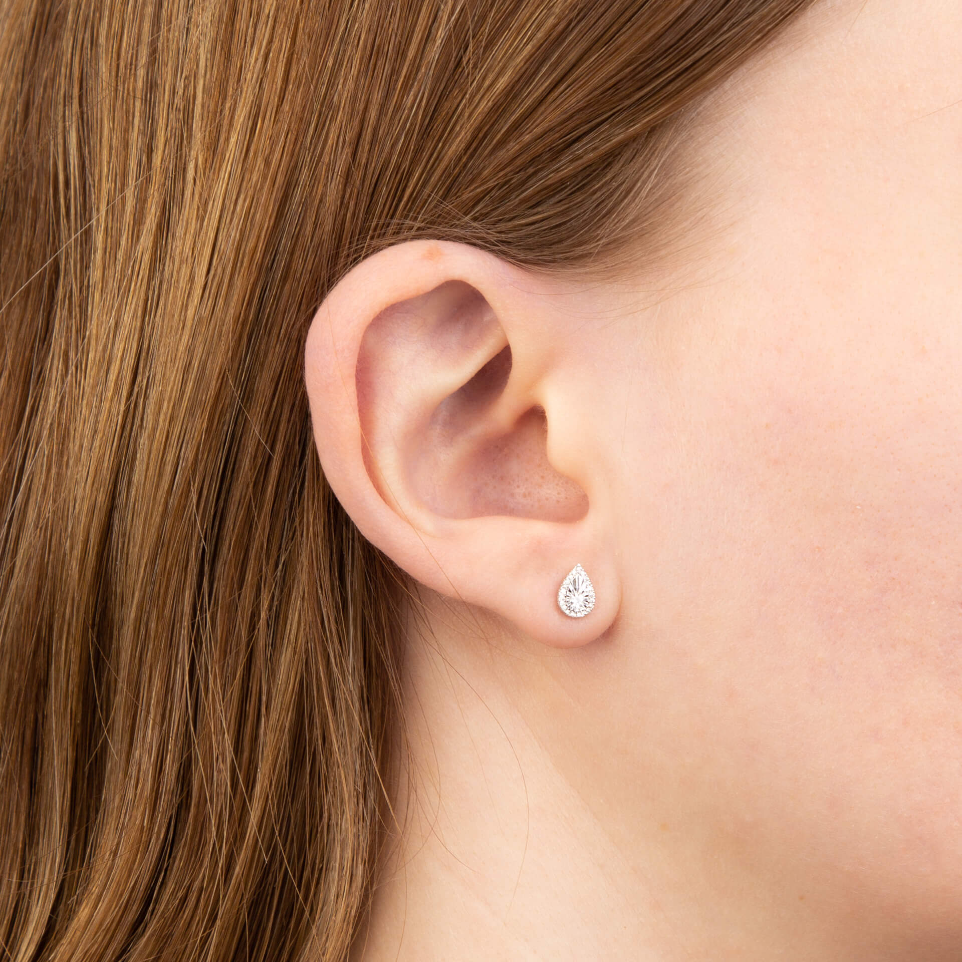 Elements Gold Diamond Cut Teardrop Stud Earrings with Diamond