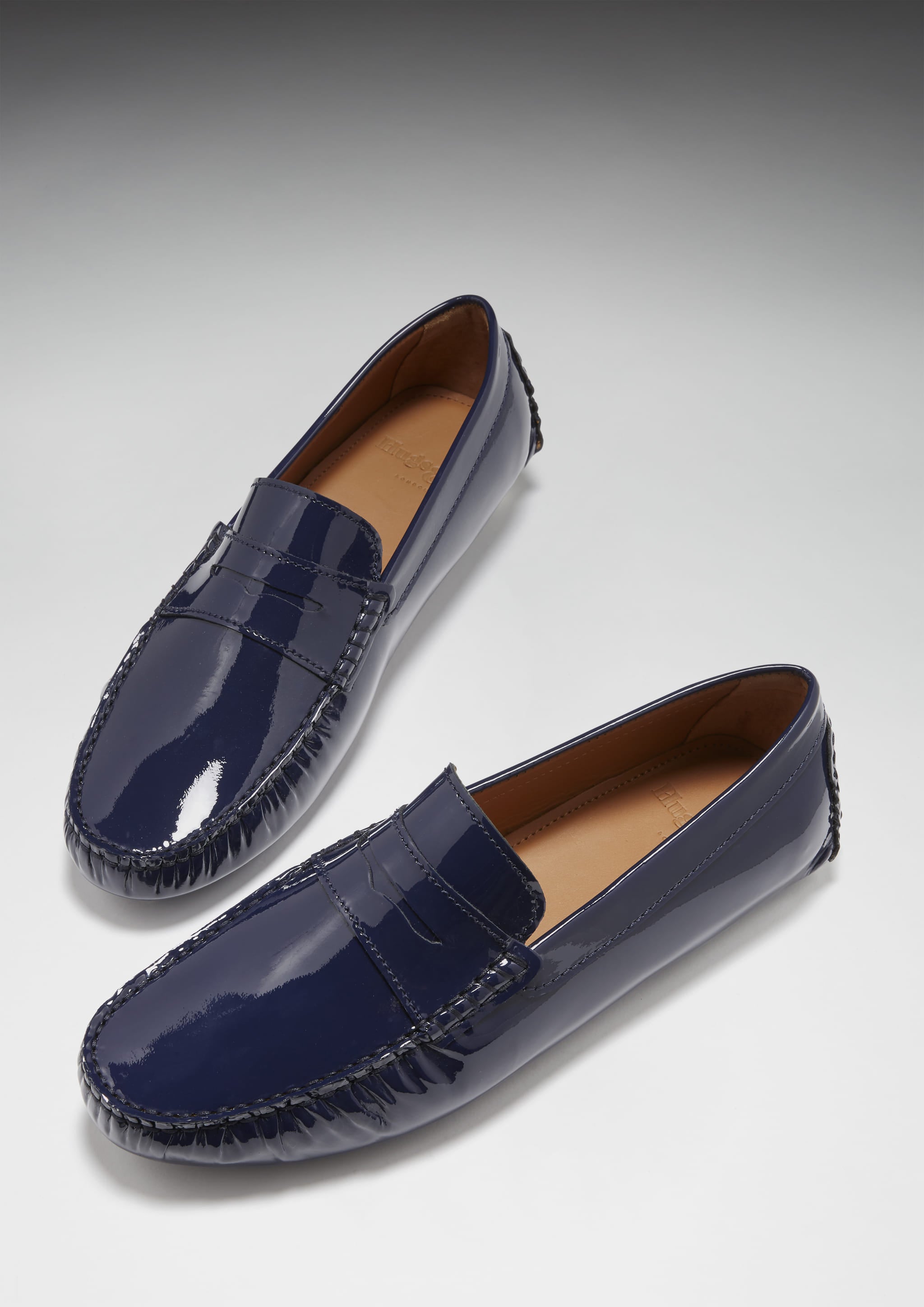 Penny Slipper, marineblaues Lackleder